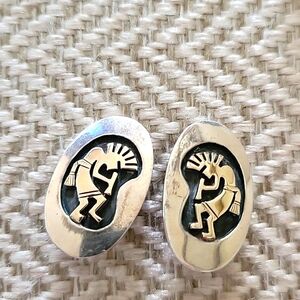 Sterling,14k gold clip kokopelli earrings by a Jackson Hole artist, signed